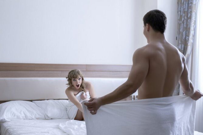 A woman admires the size of her penis